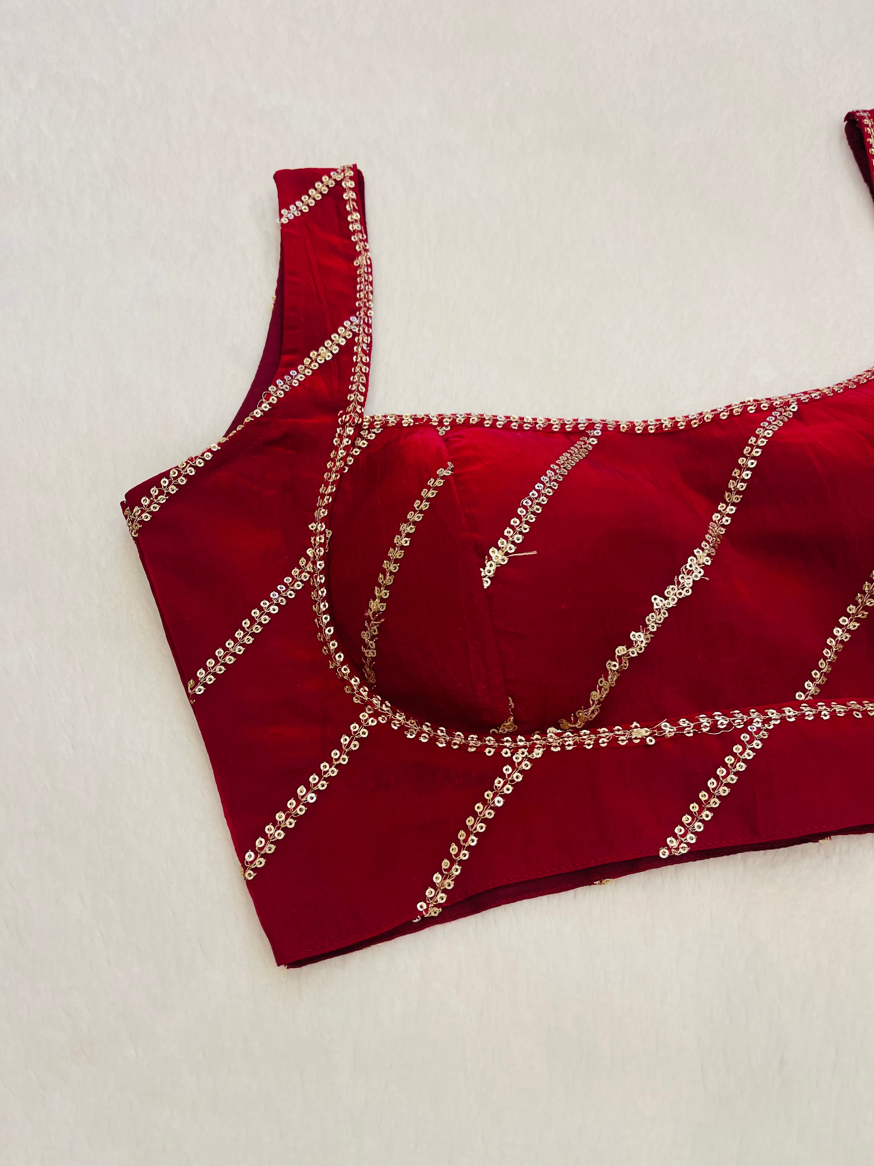 Divine maroon sleeveless blouse