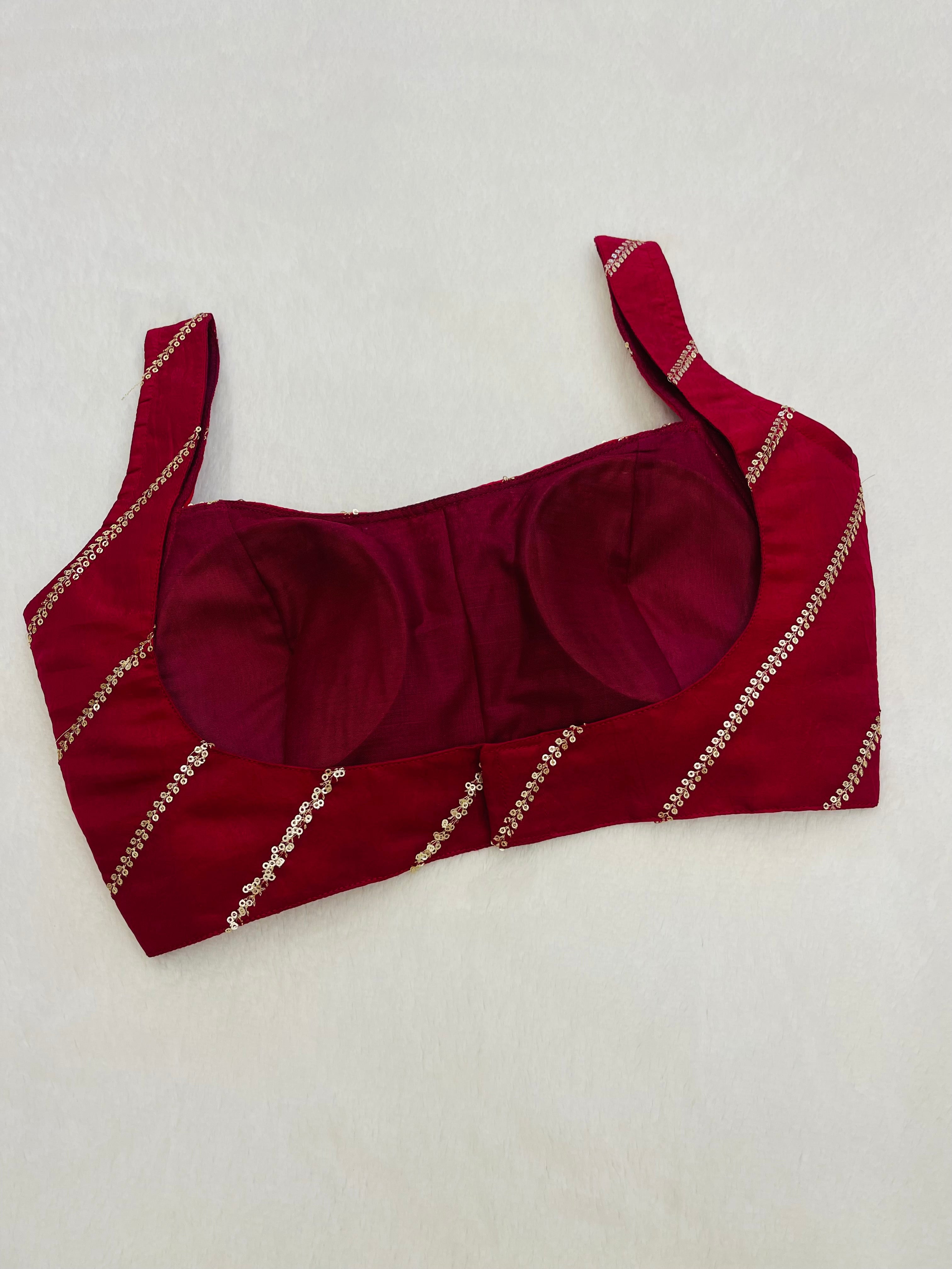 Divine maroon sleeveless blouse