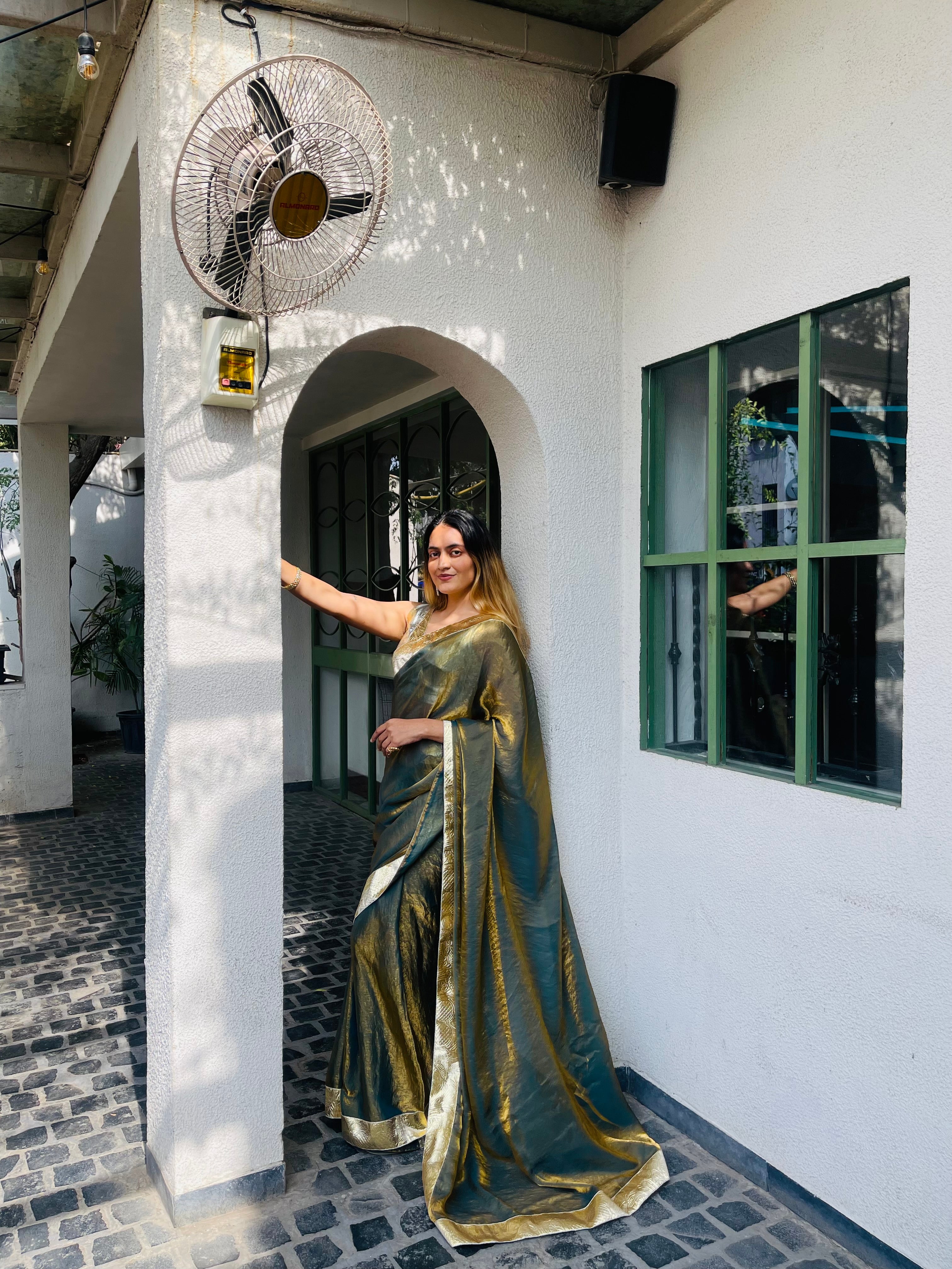 Sakhi Metalic Golden Green Saree